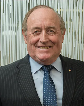 Portrait of a smiling man in suit and tie